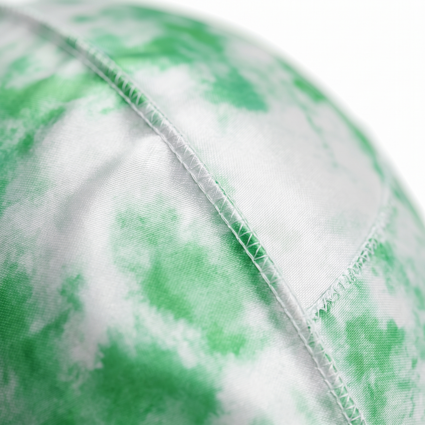 Green Tye Dye Satin Silky Durag fabric close-up showing Green Tye Dye print and stitching detail