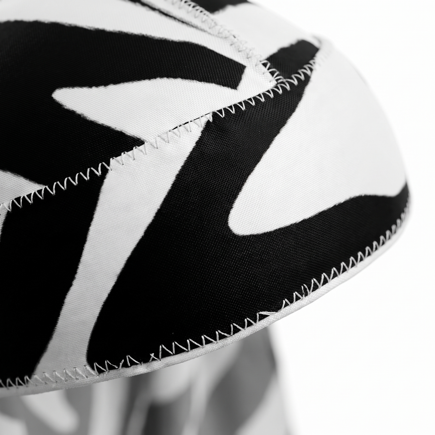 Zebra White animal print Satin Silky Durag fabric close-up showing Zebra White animal print print and stitching detail