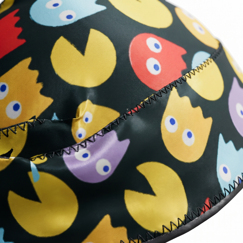 Pac-Man retro arcade Satin Silky Durag fabric close-up showing Pac-Man retro arcade print and stitching detail