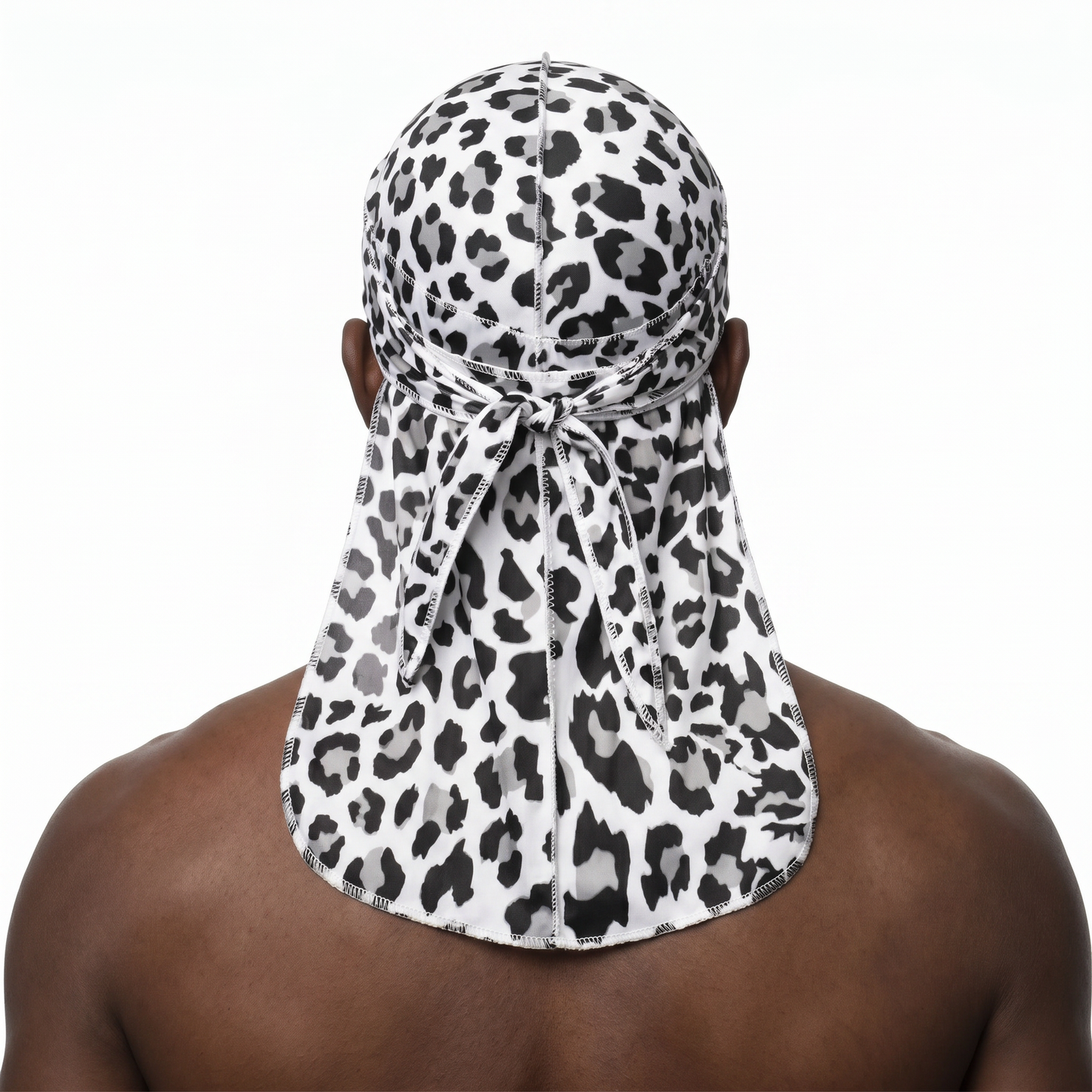 Snow Leopard spotted animal print Satin Silky Durag worn by male model, back view showing tied wrap and tail