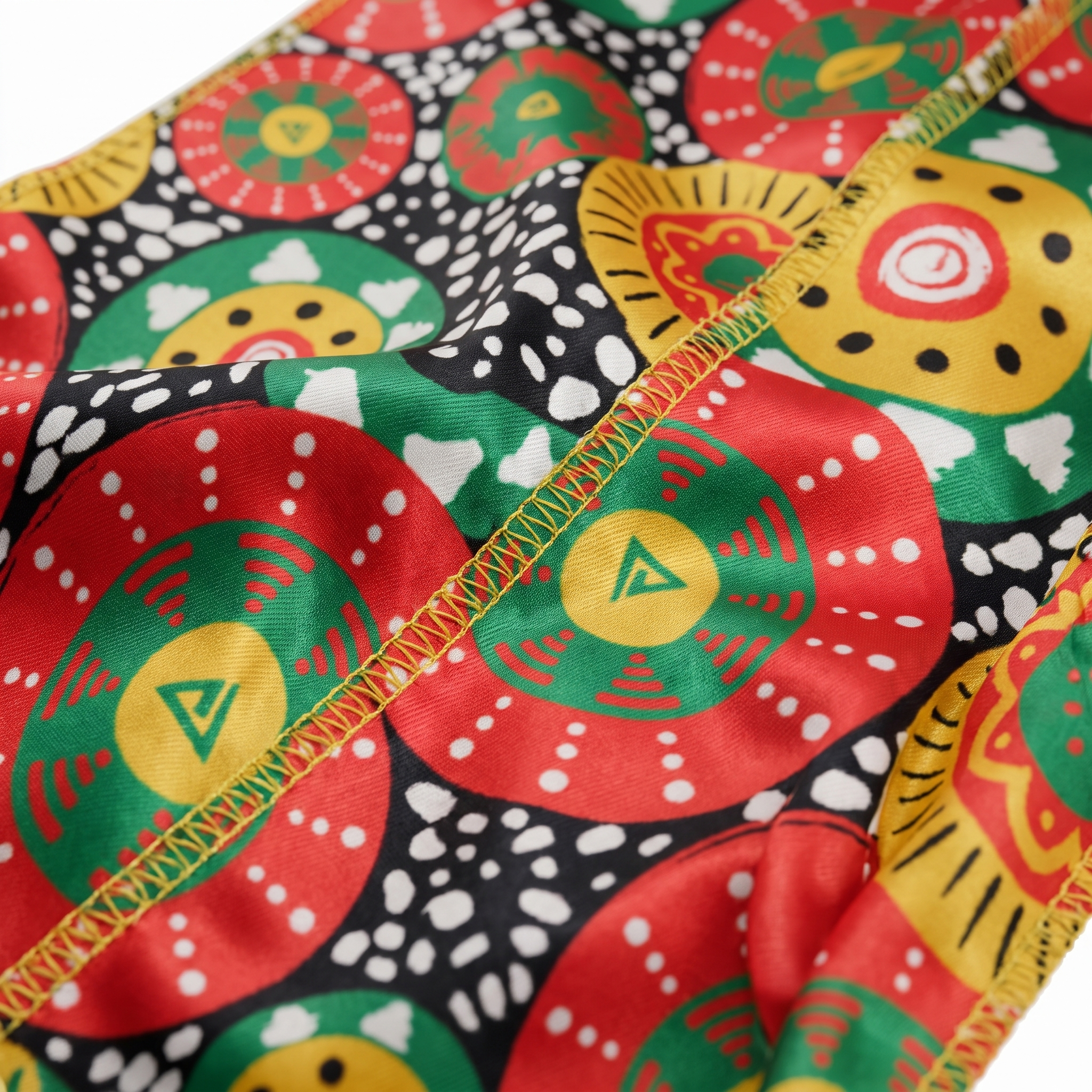 Juneteenth 4.0 red black and green Satin Silky Durag fabric close-up showing Juneteenth 4.0 red black and green print and stitching detail