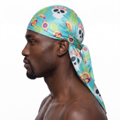 Cinco De Mayo Turquoise festive Satin Silky Durag worn by male model, side profile showing fit and tail drape