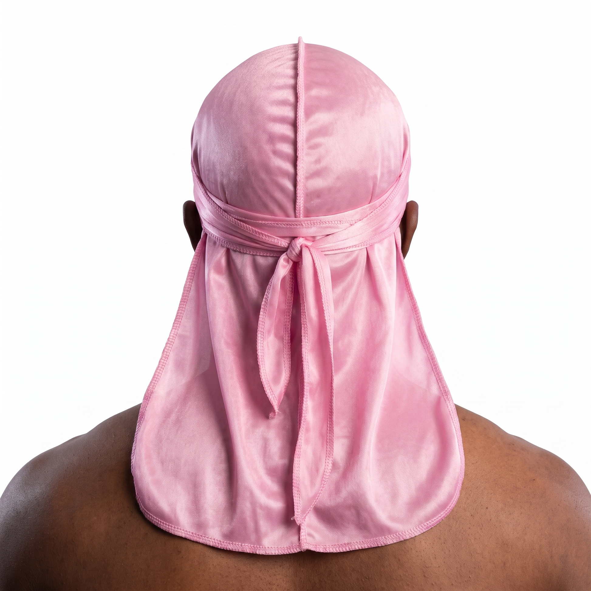 Premium Powder Pink Silk Durag worn by male model, back view showing tied wrap and tail