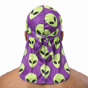 Alien Purple graphic Satin Silky Durag worn by male model, back view showing tied wrap and tail
