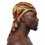 Tiger stripe animal print Satin Silky Durag worn by male model, side profile showing fit and tail drape