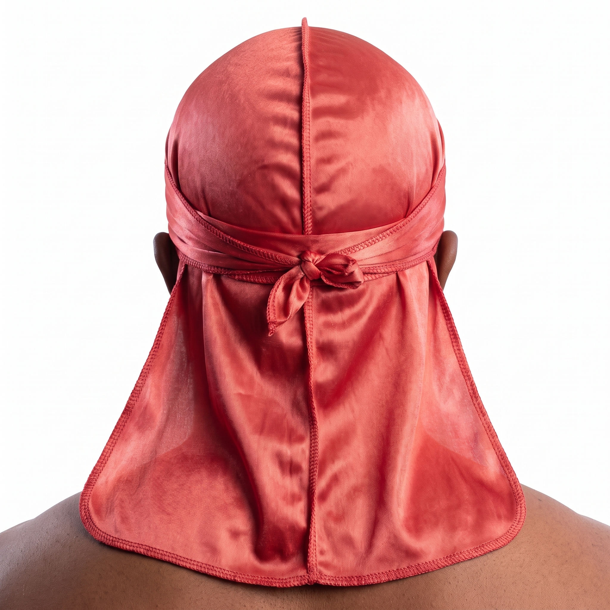 Premium Coral Red Silk Durag worn by male model, back view showing tied wrap and tail