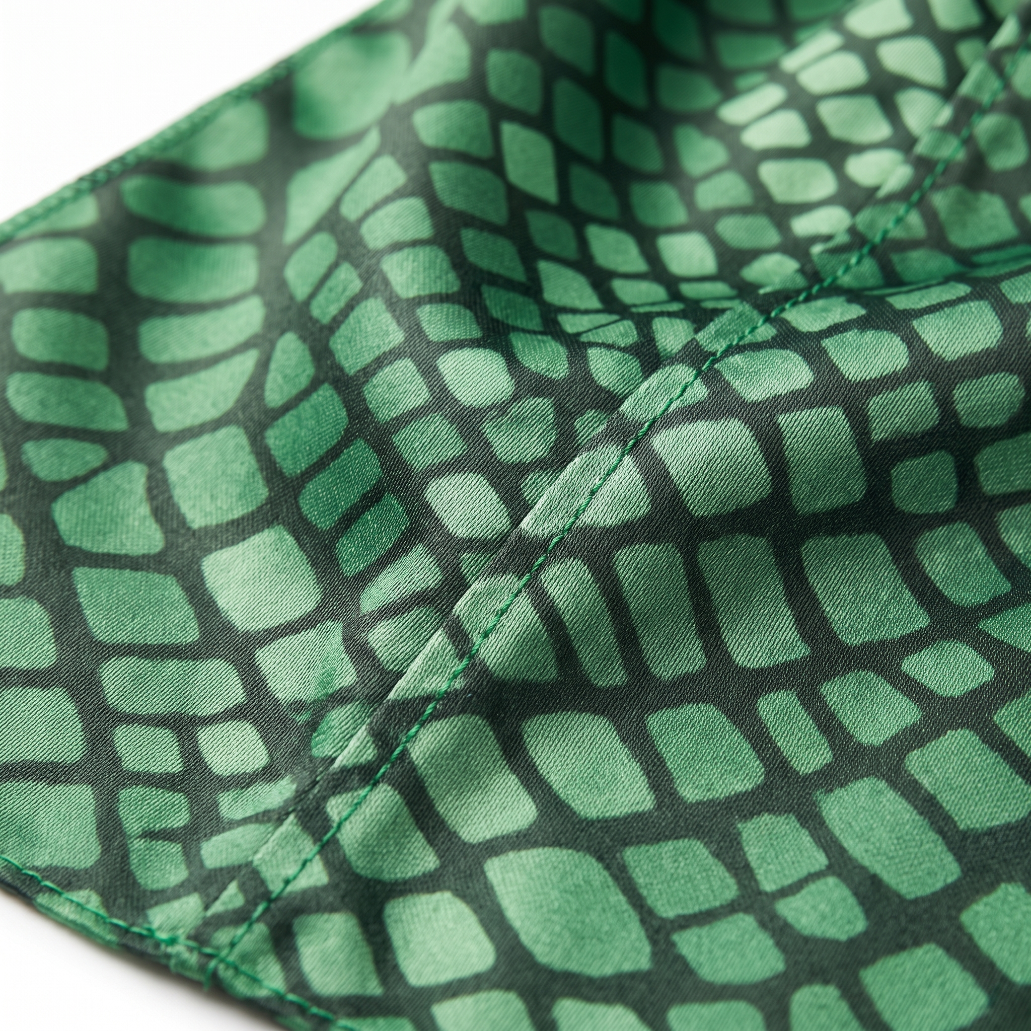 Green reptile snakeskin Satin Silky Durag fabric close-up showing Green reptile snakeskin print and stitching detail