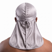 Premium Silver Grey Silk Durag worn by male model, back view showing tied wrap and tail
