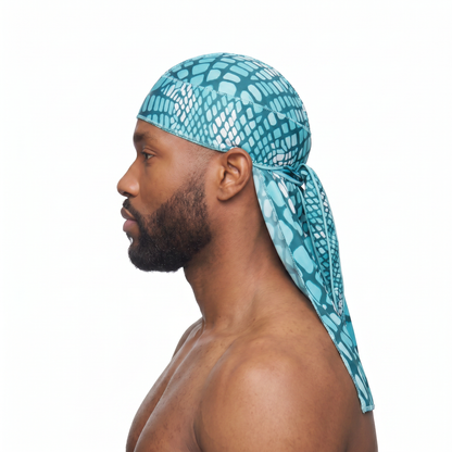 Diamond Blue reptile snakeskin Satin Silky Durag worn by male model, side profile showing fit and tail drape