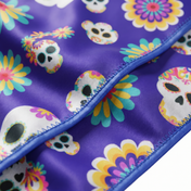 Cinco De Mayo Purple festive Satin Silky Durag fabric close-up showing Cinco De Mayo Purple festive print and stitching detail