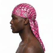 Hot Pink reptile snakeskin Satin Silky Durag worn by male model, side profile showing fit and tail drape