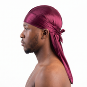 Premium Black Cherry Silk Durag worn by male model, side profile showing fit and tail drape