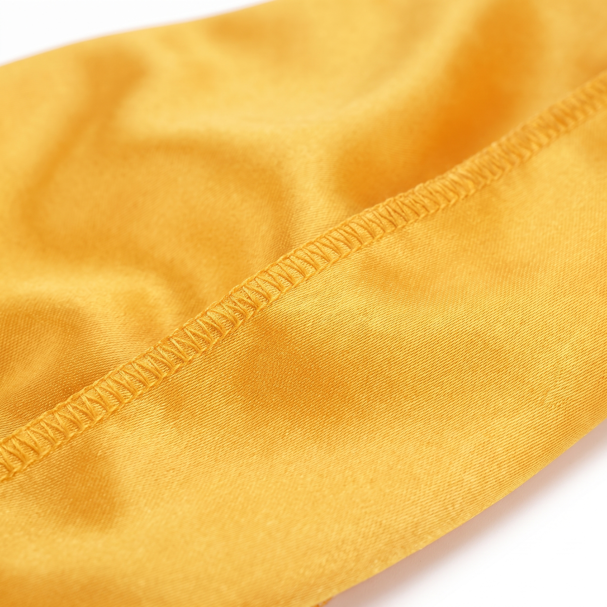 Premium Silk Durag Butterscotch Yellow fabric close-up showing Butterscotch Yellow silky satin texture and stitching detail