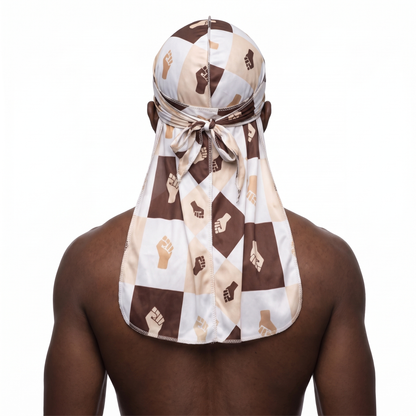 Black Power 4 graphic Satin Silky Durag worn by male model, back view showing tied wrap and tail