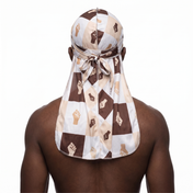 Black Power 4 graphic Satin Silky Durag worn by male model, back view showing tied wrap and tail