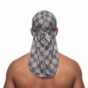 Checkered Greyscale Satin Silky Durag worn by male model, back view showing tied wrap and tail