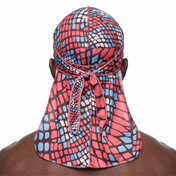 Red and Blue reptile snakeskin Satin Silky Durag worn by male model, back view showing tied wrap and tail