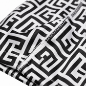 Black and White Maze geometric Satin Silky Durag fabric close-up showing Black and White Maze geometric print and stitching detail
