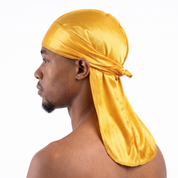 Premium Silk Durag Butterscotch Yellow worn by male model, side profile showing fit and tail drape