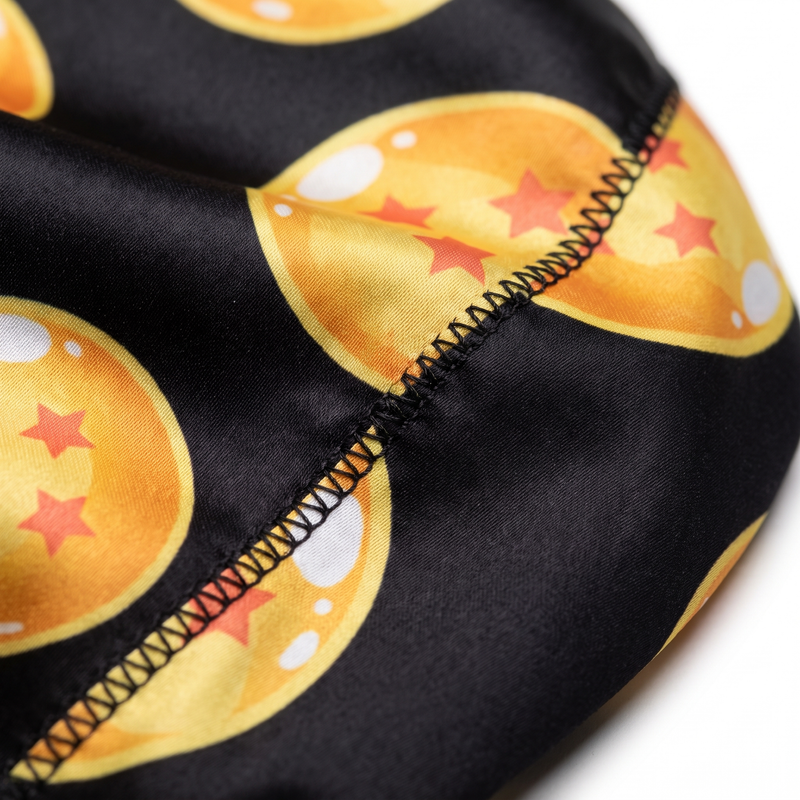 Dragon Ball Z Black Satin Silky Durag fabric close-up showing Dragon Ball Z Black print and stitching detail