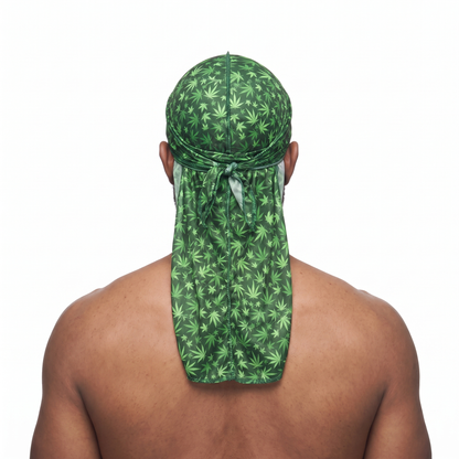 Cannabis Green leaf print Satin Silky Durag worn by male model, back view showing tied wrap and tail