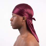 Premium Wine Red Silk Durag worn by male model, side profile showing fit and tail drape