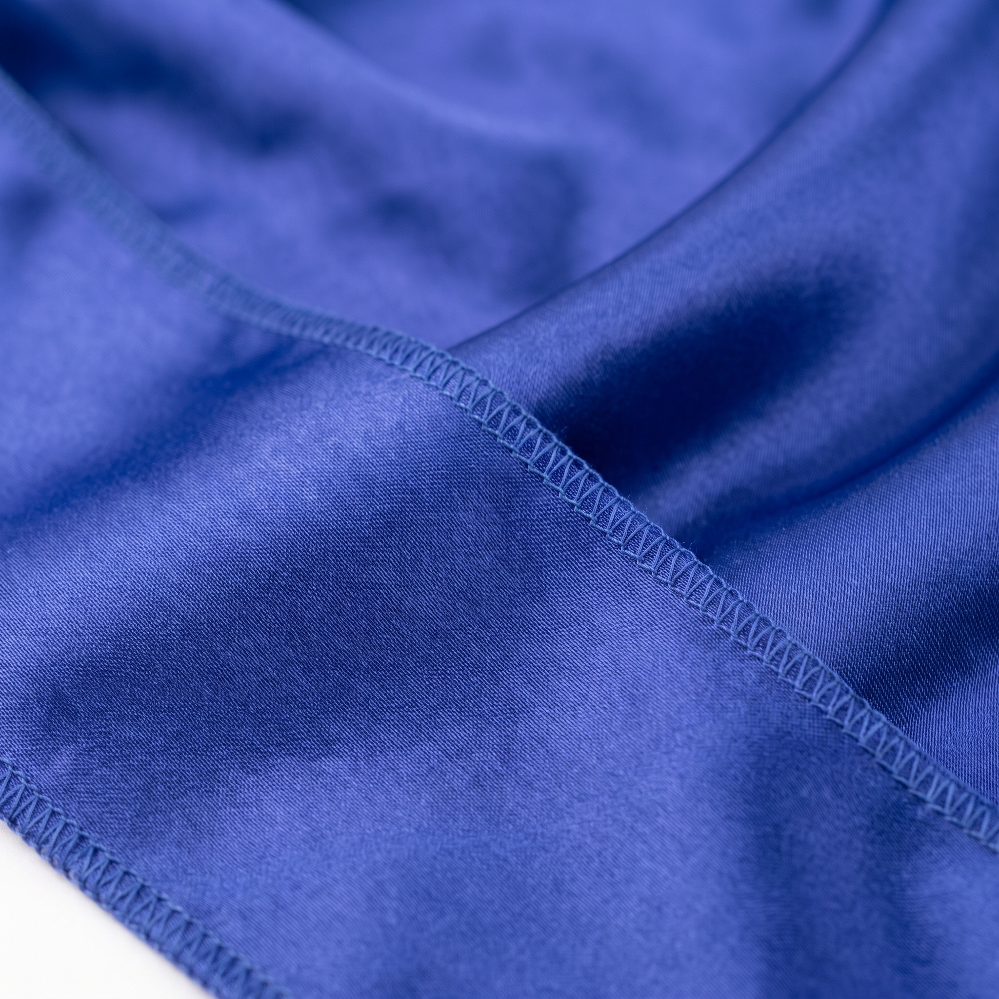 Premium Silk Durag Persian Blue fabric close-up showing Persian Blue silky satin texture and stitching detail