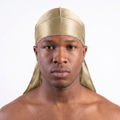 Premium Champagne Gold Silk Durag worn by male model, front view on white background