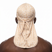 Sand Maze geometric Satin Silky Durag worn by male model, back view showing tied wrap and tail