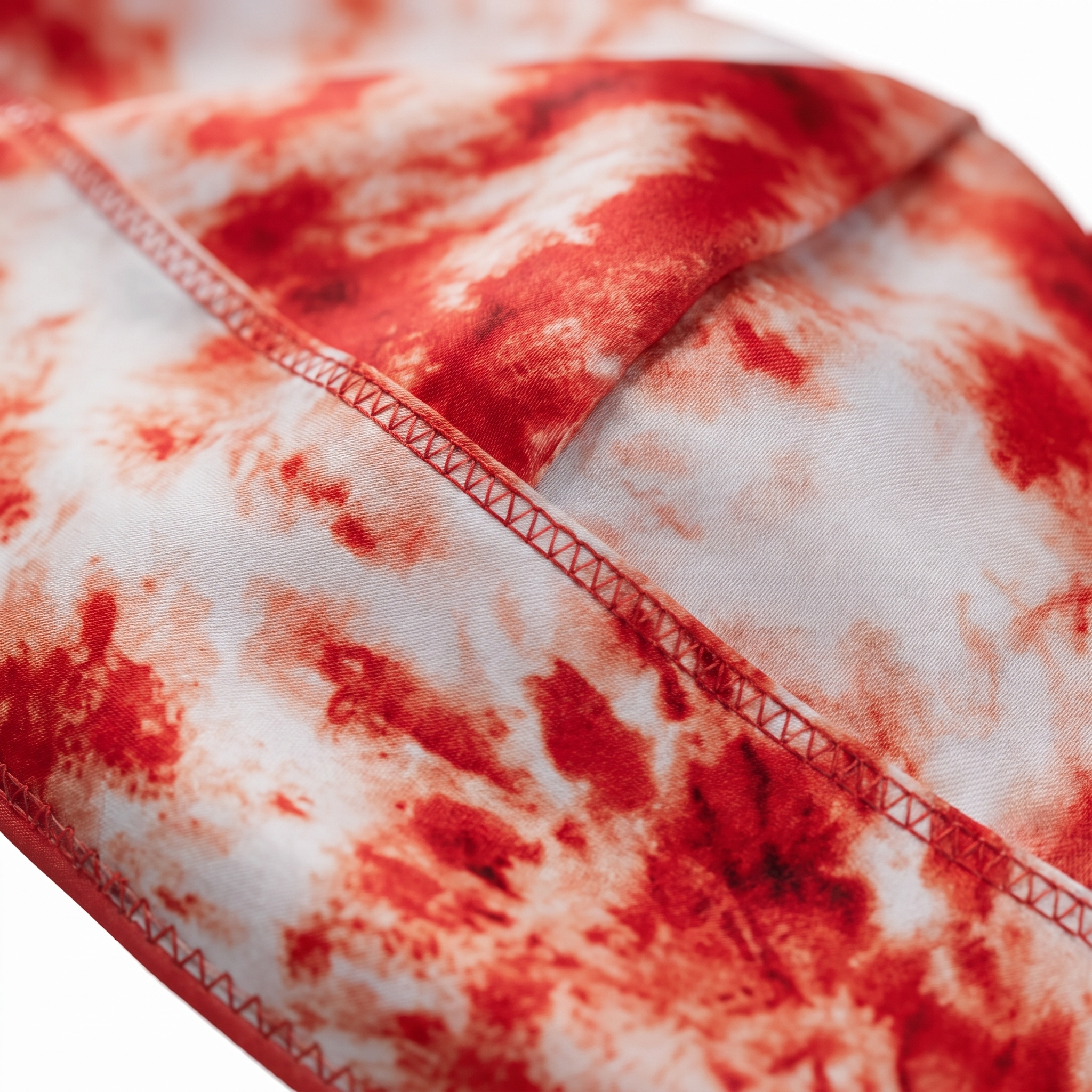 Red Tye Dye Satin Silky Durag fabric close-up showing Red Tye Dye print and stitching detail