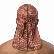 Clay reptile snakeskin Satin Silky Durag worn by male model, back view showing tied wrap and tail