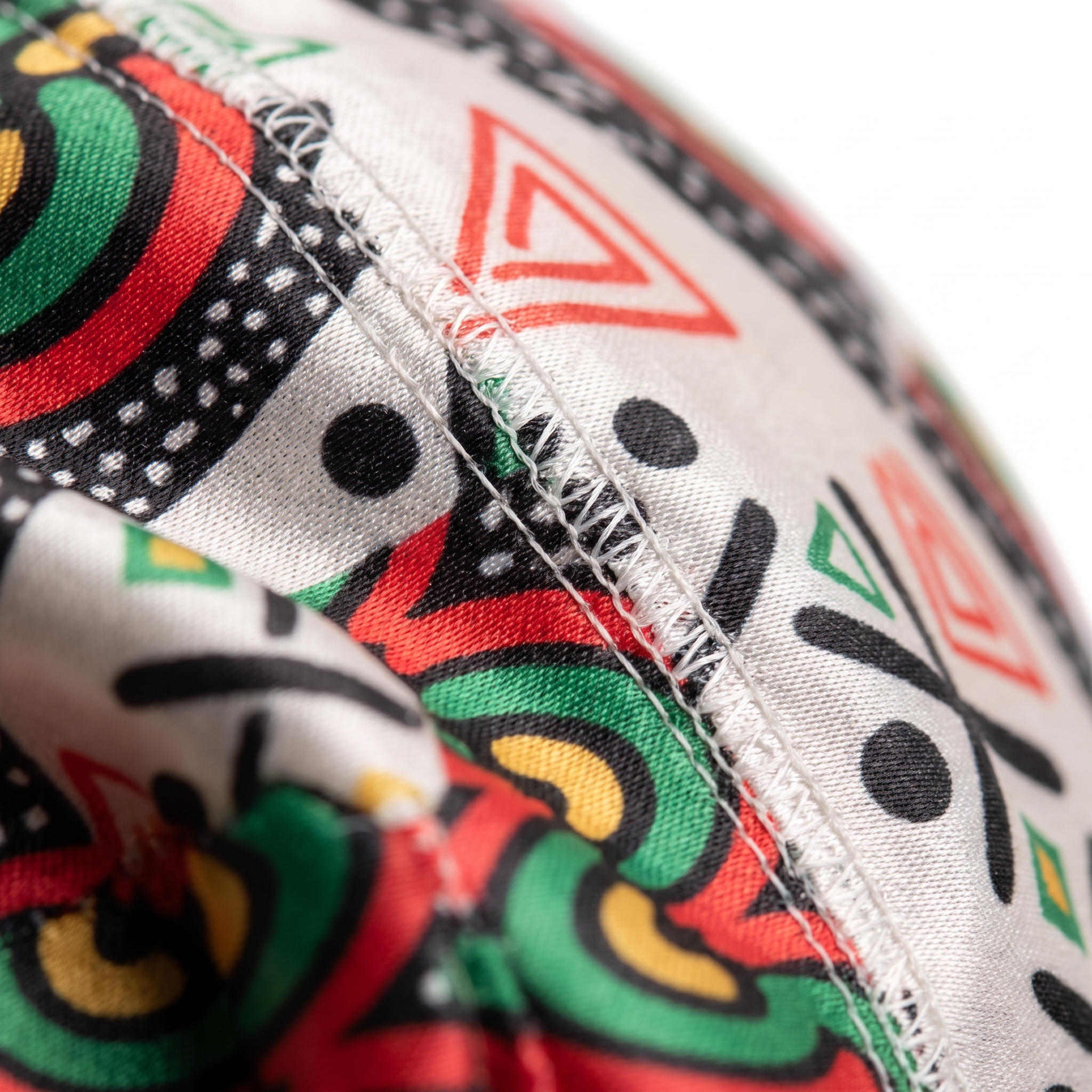 Juneteenth 3.0 red black and green Satin Silky Durag fabric close-up showing Juneteenth 3.0 red black and green print and stitching detail