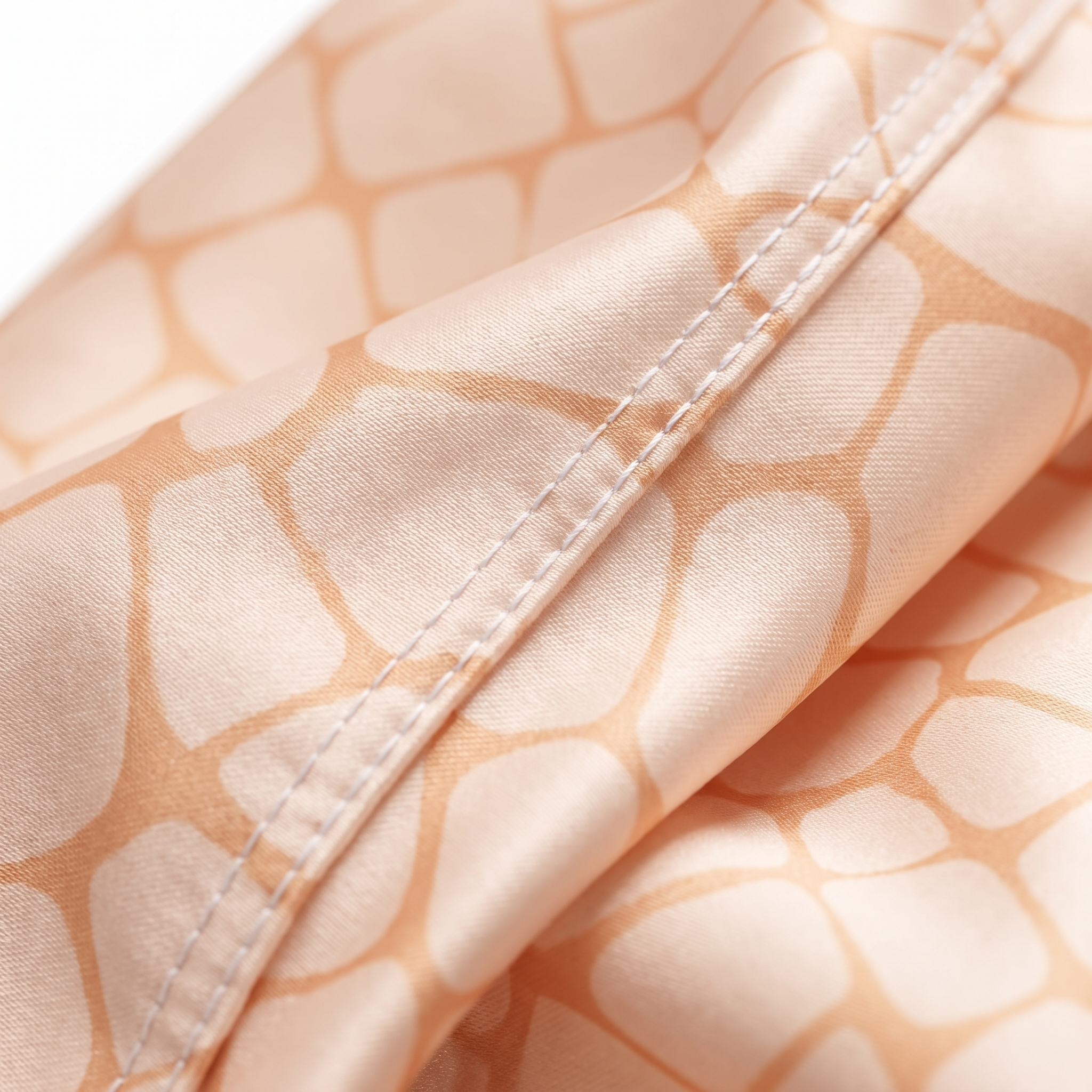 Peach crocodile skin Satin Silky Durag fabric close-up showing Peach crocodile skin print and stitching detail