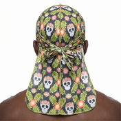 Cinco De Mayo Green festive Satin Silky Durag worn by male model, back view showing tied wrap and tail