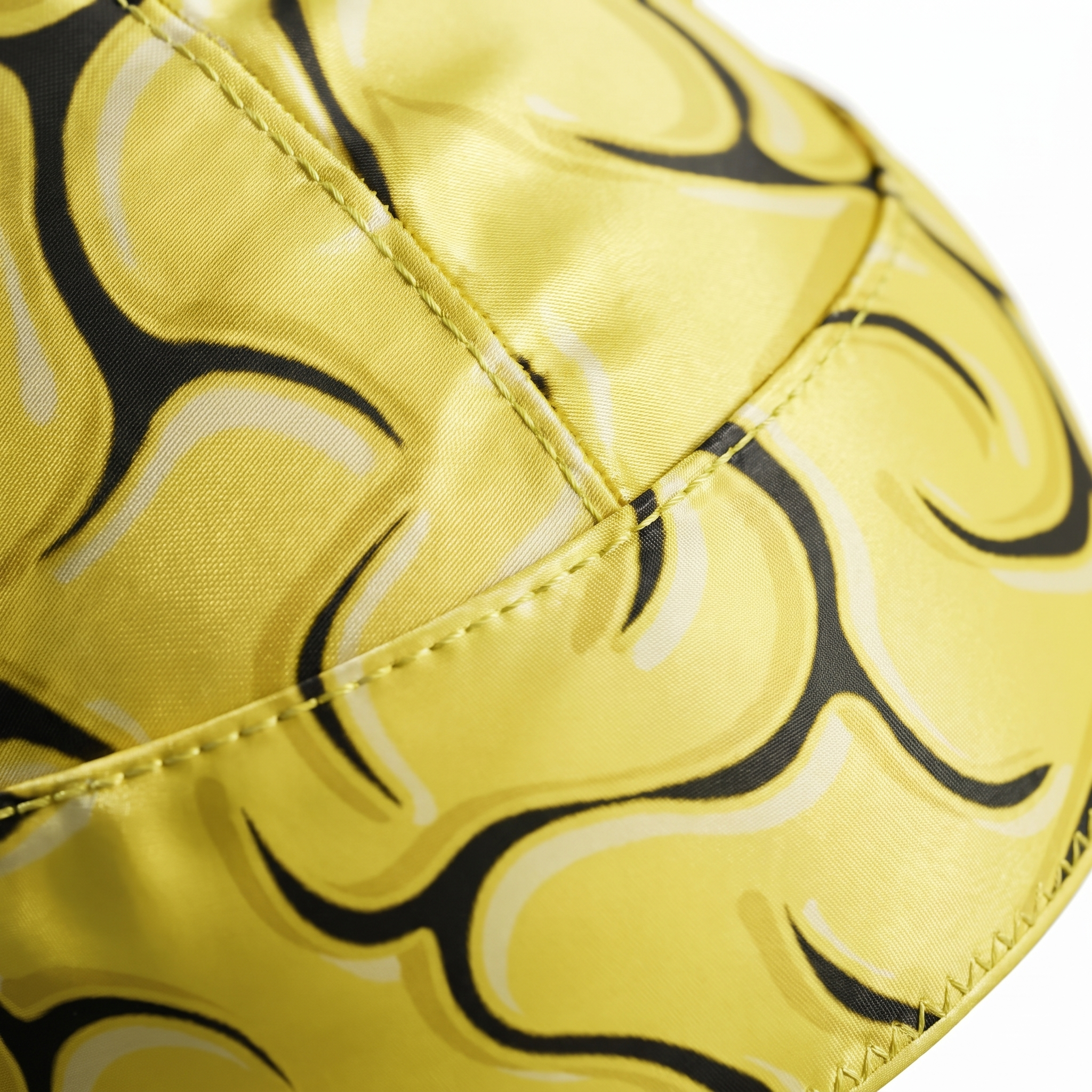 Yellow Brains graphic Satin Silky Durag fabric close-up showing Yellow Brains graphic print and stitching detail