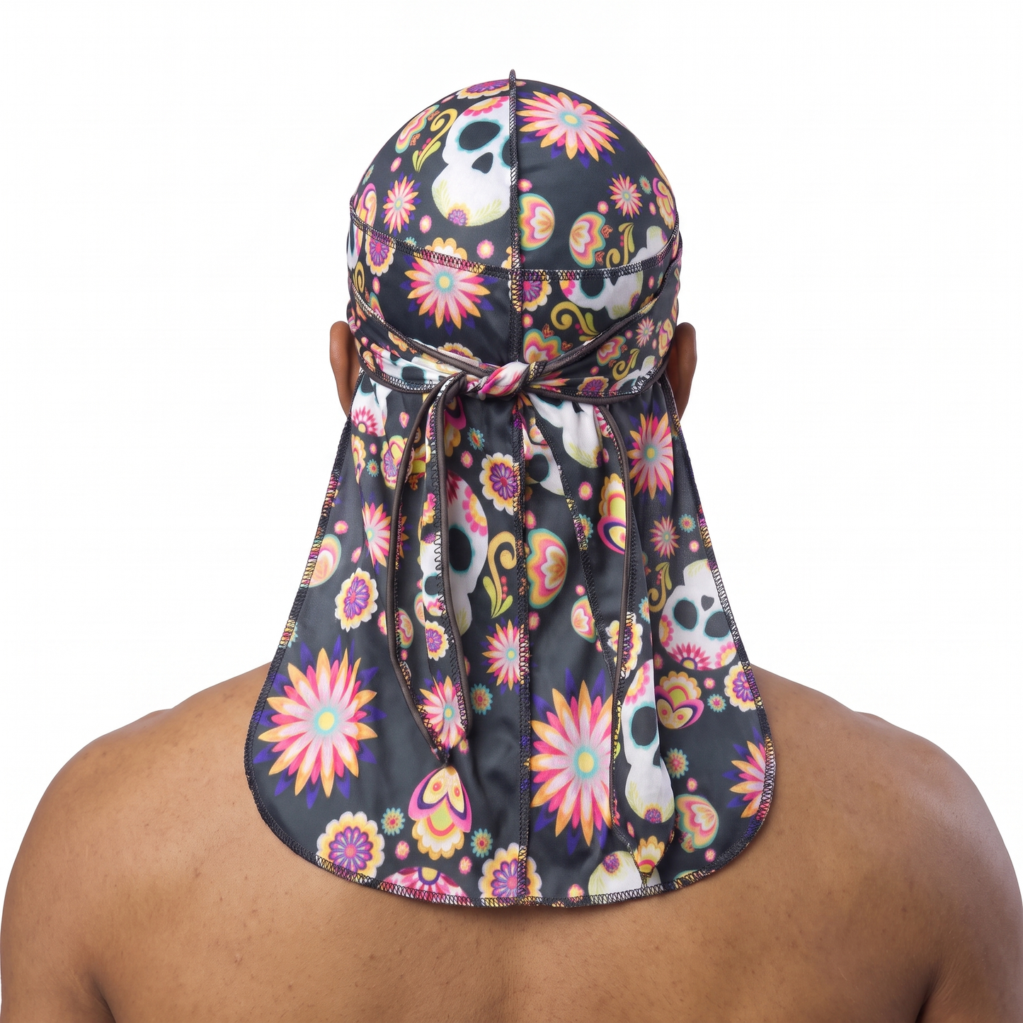 Cinco De Mayo Black festive Satin Silky Durag worn by male model, back view showing tied wrap and tail