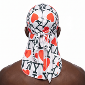 I Love NY graphic Satin Silky Durag worn by male model, back view showing tied wrap and tail