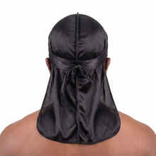 Premium Black Silk Durag worn by male model, back view showing tied wrap and tail
