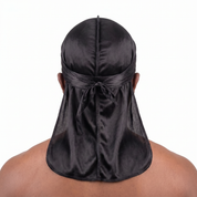 Premium Black Silk Durag worn by male model, back view showing tied wrap and tail