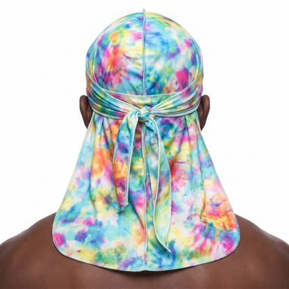 Color Bomb multicolor Tye Dye Satin Silky Durag worn by male model, back view showing tied wrap and tail