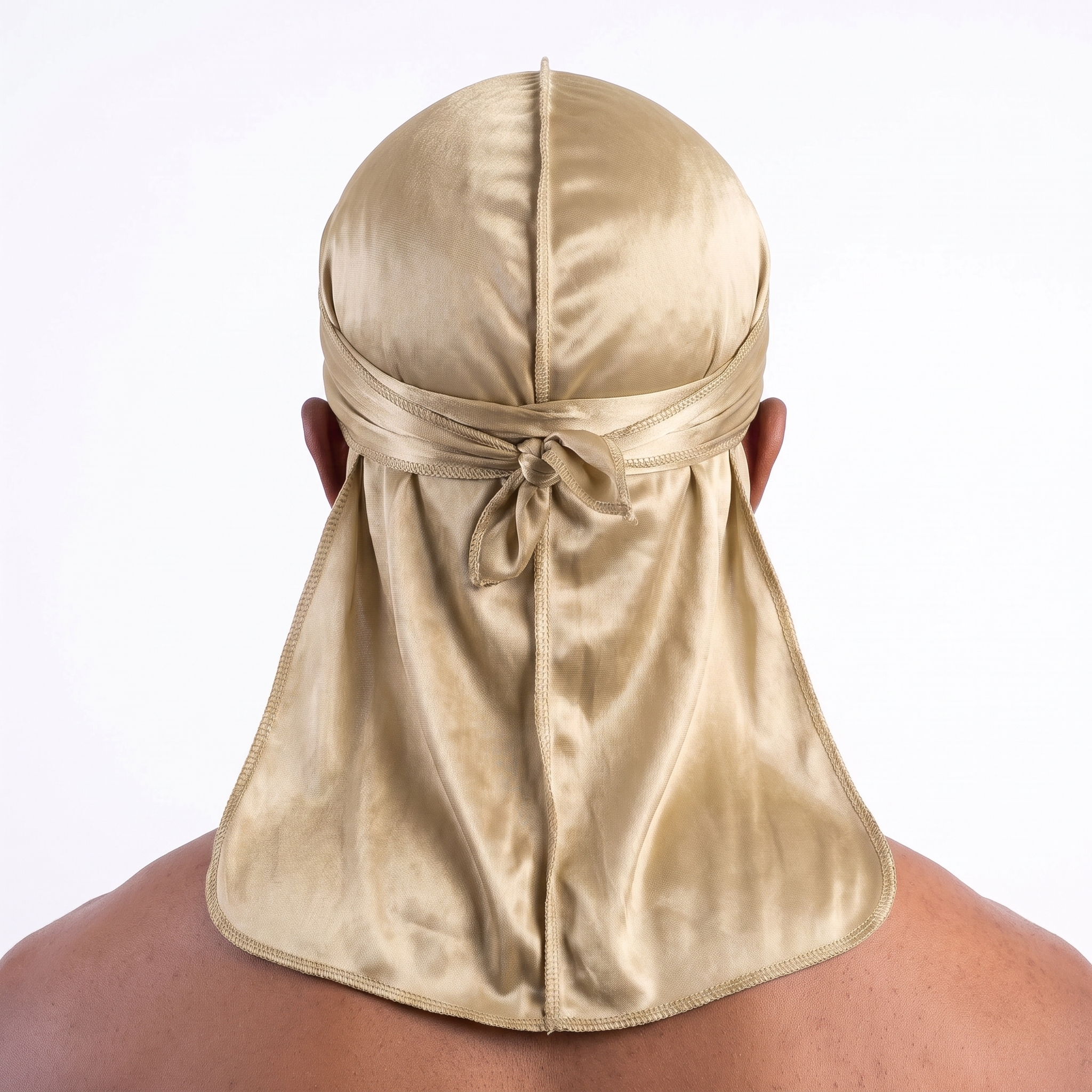 Premium Champagne Gold Silk Durag worn by male model, back view showing tied wrap and tail