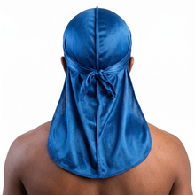 Premium True Blue Silk Durag worn by male model, back view showing tied wrap and tail