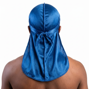 Premium True Blue Silk Durag worn by male model, back view showing tied wrap and tail