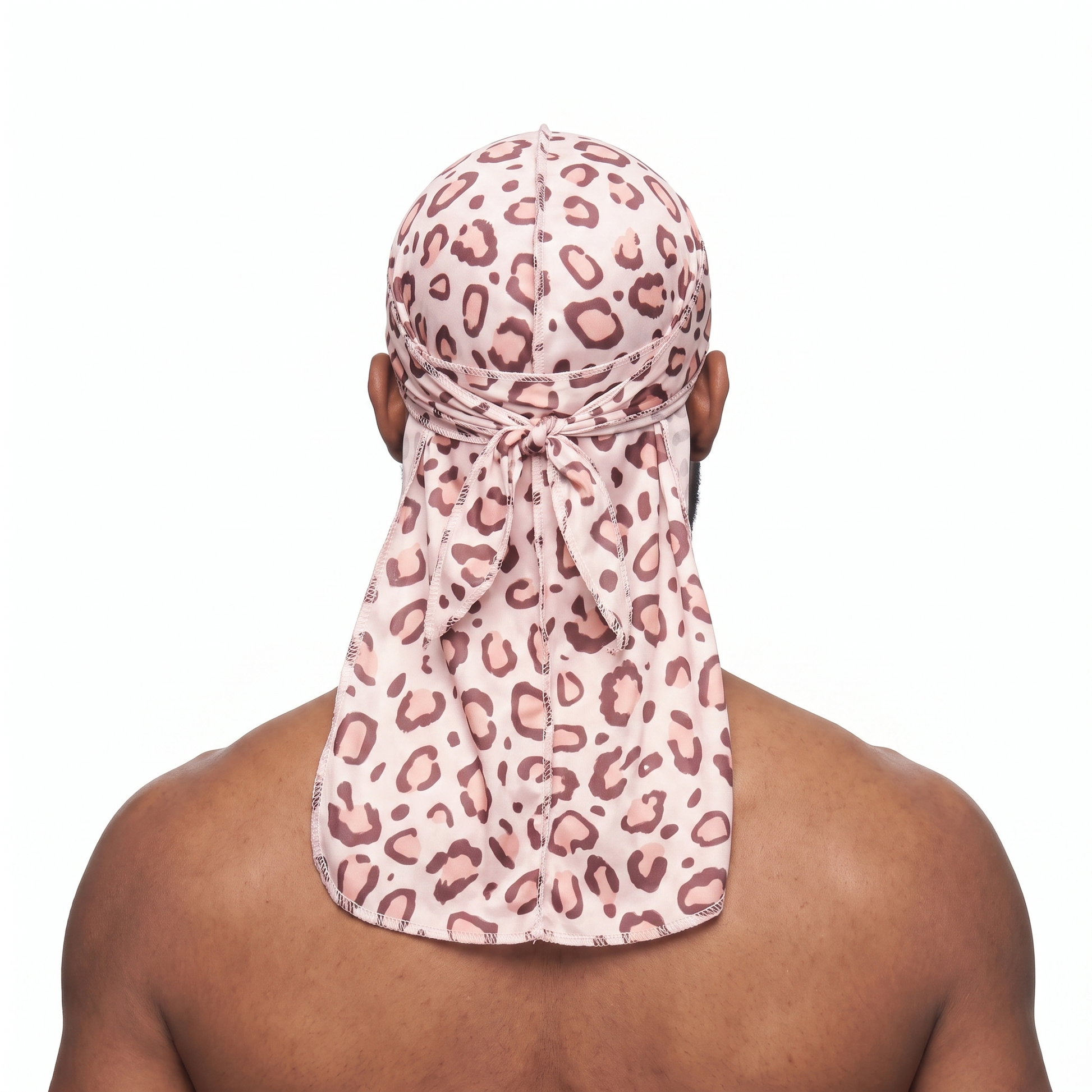 Pink leopard animal print Satin Silky Durag worn by male model, back view showing tied wrap and tail