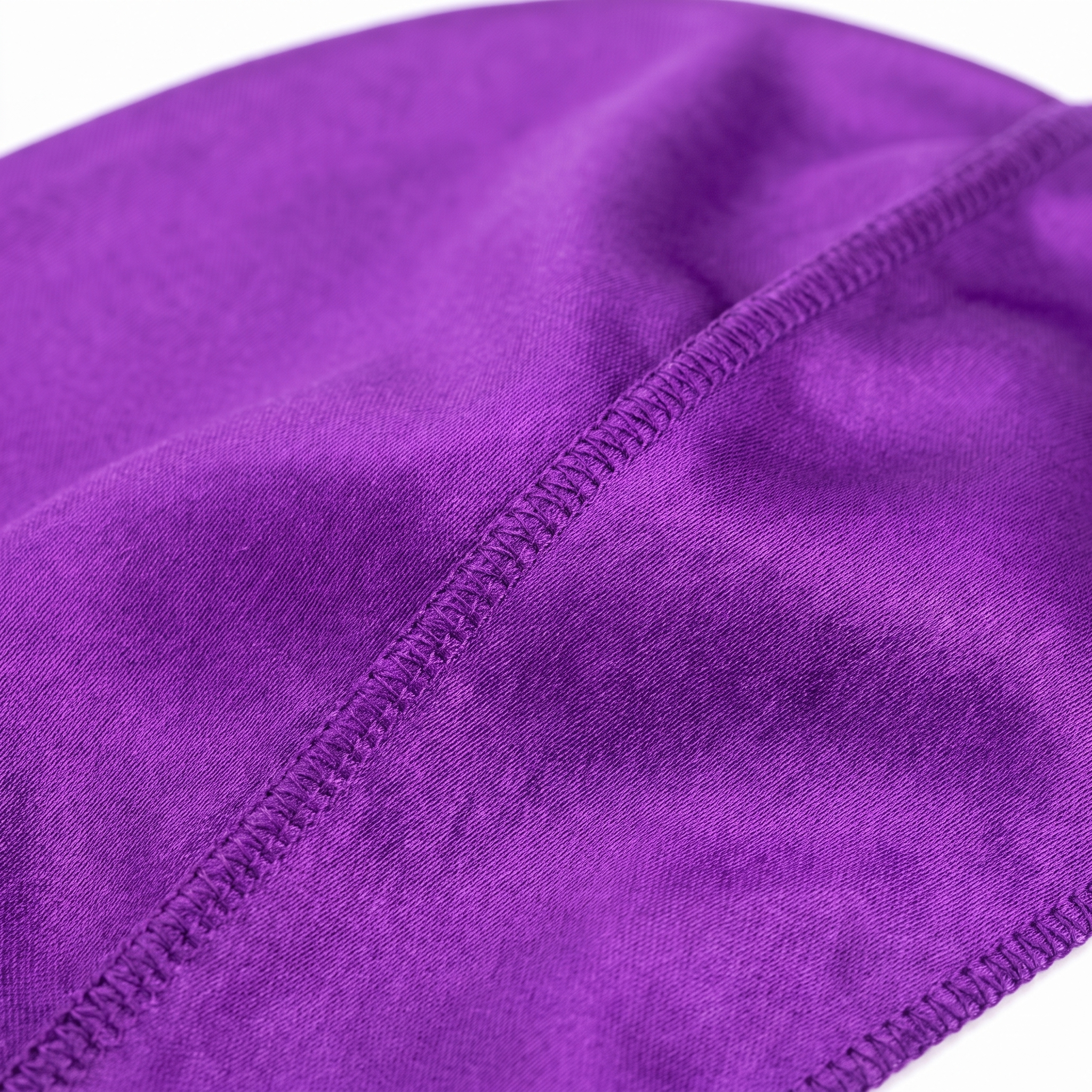 Premium Purple Silk Durag fabric close-up showing Purple silky satin texture and stitching detail