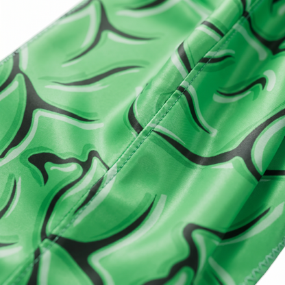 Green Brains graphic Satin Silky Durag fabric close-up showing Green Brains graphic print and stitching detail