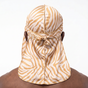 Zebra Cream animal print Satin Silky Durag worn by male model, back view showing tied wrap and tail