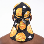 Dragon Ball Z Black Satin Silky Durag worn by male model, back view showing tied wrap and tail