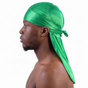 Premium Silk Durag Green worn by male model, side profile showing fit and tail drape