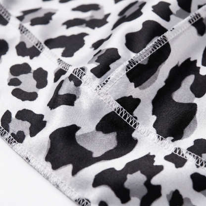 Snow Leopard spotted animal print Satin Silky Durag fabric close-up showing Snow Leopard spotted animal print print and stitching detail